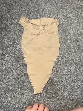 Skims strapless sculpting thong bodysuit in tan XS Extra Small Skims bodysuit